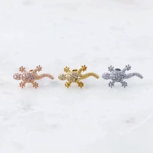 Gold and rhinestone lizard 16g cartilage earring